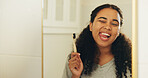 Mirror, toothbrush and woman in bathroom with wink for dental hygiene, oral wellness and natural. Bamboo, tongue out and happy person brushing teeth, eco friendly or cleaning with reflection in house