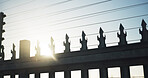 Outdoor, safety or electrical fence with gate, high voltage circuit or steel boundary for protection. Wire, powerline or border with metal infrastructure for crime defense, security or access control