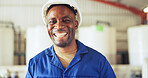 Happy, black man and laughing with helmet in factory for production, distribution or maintenance. Male person, engineer or smile with hard hat in manufacturing plant for funny joke or repair service