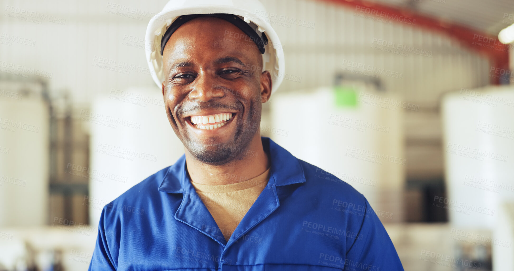 Buy stock photo Happy, black man and laughing with helmet in factory for production, distribution or maintenance. Male person, engineer or smile with hard hat in manufacturing plant for funny joke or repair service