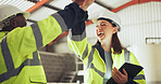 People, engineer and high five with tablet at warehouse for good news, inspection and project success. Smile, team and laugh with digital for celebration, quality control and construction achievement