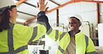 People, engineer and high five with smile at warehouse for good news, inspection and project success. Happy, team and laugh for manufacturing celebration, quality control and construction achievement