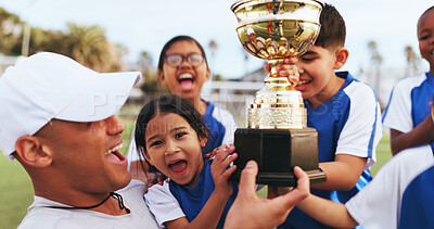 Buy stock photo Excited, coach and kids with trophy on field, soccer tournament success and celebration victory. Football team, winning match award or happy children with man for achievement, competition or cheering