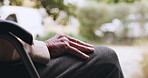 Outdoor, hands or senior person with wheelchair for retirement, morning peace or weekend reflection. Calm, nostalgia or elderly man with disability in nature for fresh air, wellness or perspective