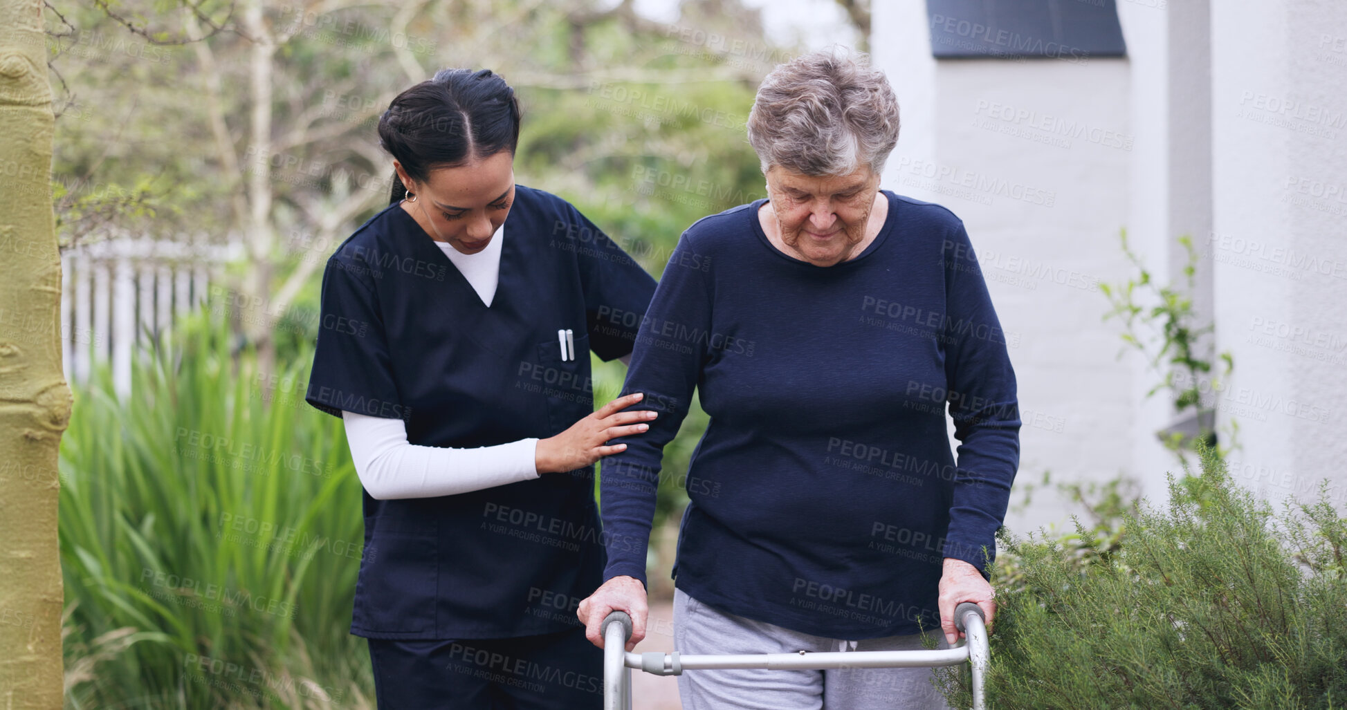 Buy stock photo Walker, nurse and help with old woman outdoor for support, physiotherapy and walking aid. Healthcare, rehabilitation and retirement with senior person with a disability in garden of home for balance