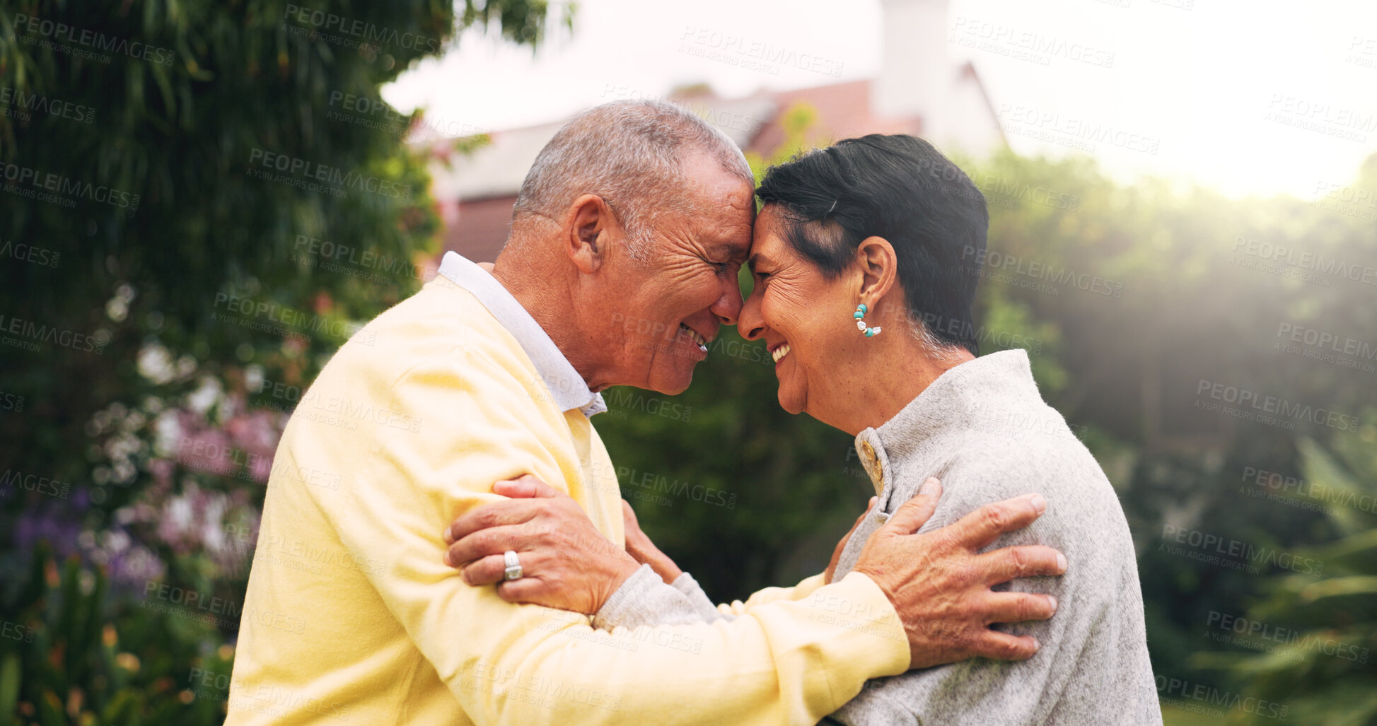 Buy stock photo Hug, love and care with old couple outdoor for connection, retirement and bonding together. Smile, marriage partner and commitment with senior man and woman in backyard of home for relationship