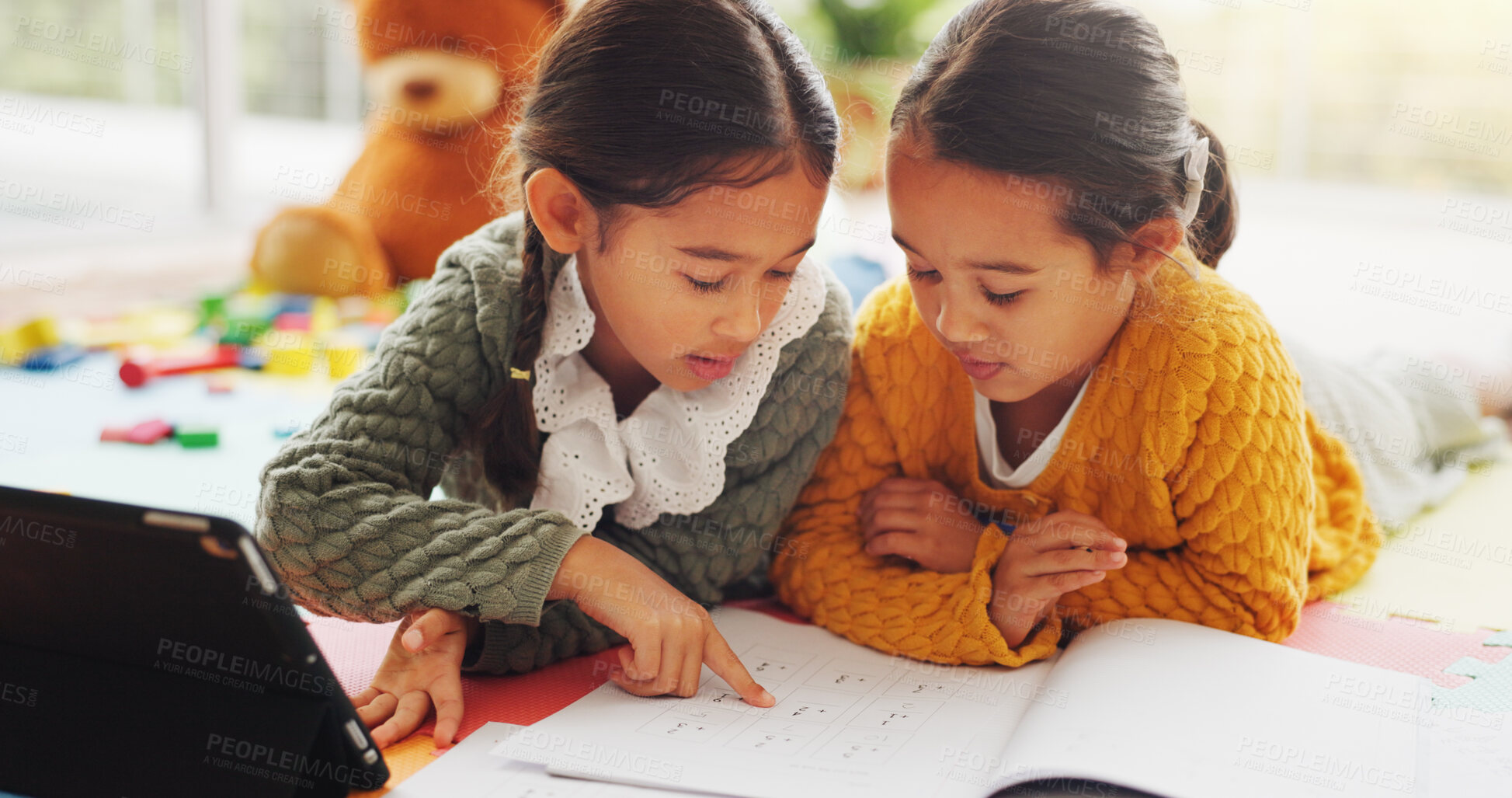 Buy stock photo Book, tablet and learning with children in home for math assessment, studying or digital lesson. Online course, education app and student project with kids on floor of house for research and growth
