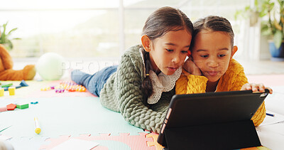 Buy stock photo Reading, tablet and learning with children in home for math assessment, studying or digital lesson. Online course, education app and student project with kids in house for research and growth