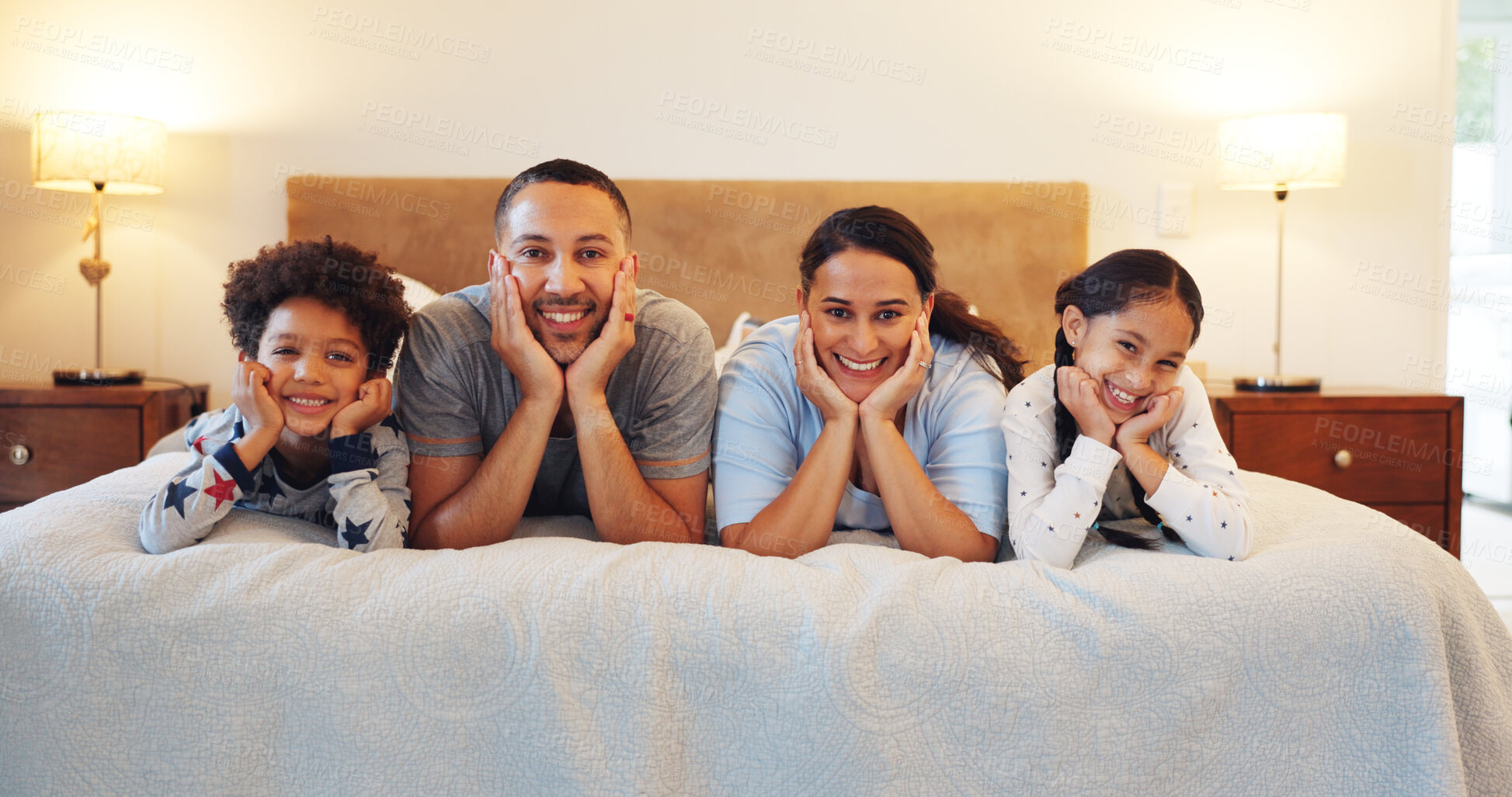 Buy stock photo Smile, relax and portrait of family in bedroom of home for bonding, support and connection together. Happiness, weekend break and love with parents and children in bed of apartment for trust