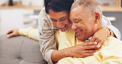 Buy stock photo Smile, hug and senior couple on sofa in home for bonding, marriage or connection on weekend. Happy, love and elderly woman embracing man in living room for trust, safety or care in apartment.