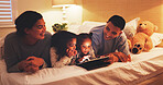 Tablet, relax and watching movie with family in bedroom of home for bonding, streaming service and night. Love, film subscription and support with parents and children in bed of apartment for bedtime