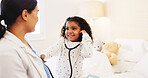 Stethoscope, playful and doctor with child in bedroom for heartbeat, medical consulting and trust. Smile, healthcare and breathing exam with kid and woman in home for house call and pediatrician