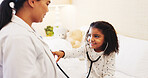 Stethoscope, smile and doctor with child in bedroom for heartbeat, medical consulting and trust. Playful, healthcare and breathing exam with kid and woman in home for house call and pediatrician