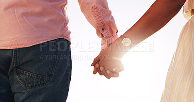 Buy stock photo Holding hands, love and travel with couple outdoor for connection, romance and anniversary getaway. Marriage commitment, summer vacation and trust with man and woman for support, care and partner