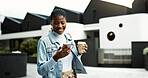 Walking, business and black woman in city with earphones for music, thinking and morning commute. Happy, travel and person with coffee and cellphone for streaming audio, podcast and playlist in town