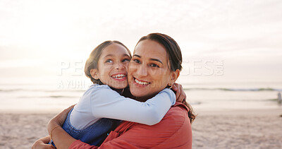 Buy stock photo Happy, hug and mom with child at beach for bonding, love and connection on summer holiday. Family, ocean and mother with girl in embrace for relationship, affection and support on vacation together