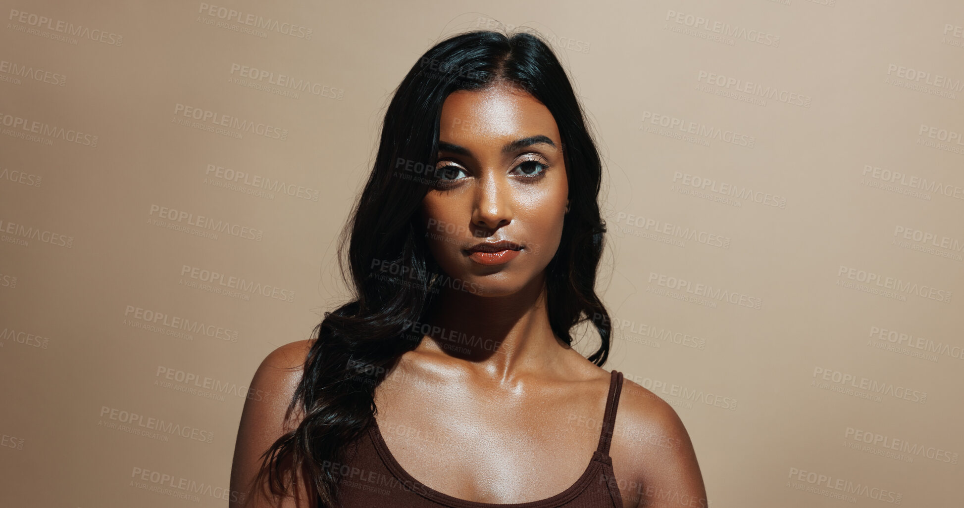 Buy stock photo Portrait, skincare and woman in studio, confidence and natural dermatology on brown background space. Glow, healthy skin and serious person with beauty cosmetics for shine, wellness and cosmetology