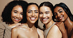 Skincare, diversity or women in studio with portrait, smooth skin or glow in facial care. Smile, group of people on brown background with confidence, dermatology or natural cosmetics for soft touch.