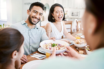 Buy stock photo Family, parents and child in dining room with food, smile and thanksgiving lunch for bonding together. Happy, people and generations in home with daughter, grandmother and serving meal for nutrition.