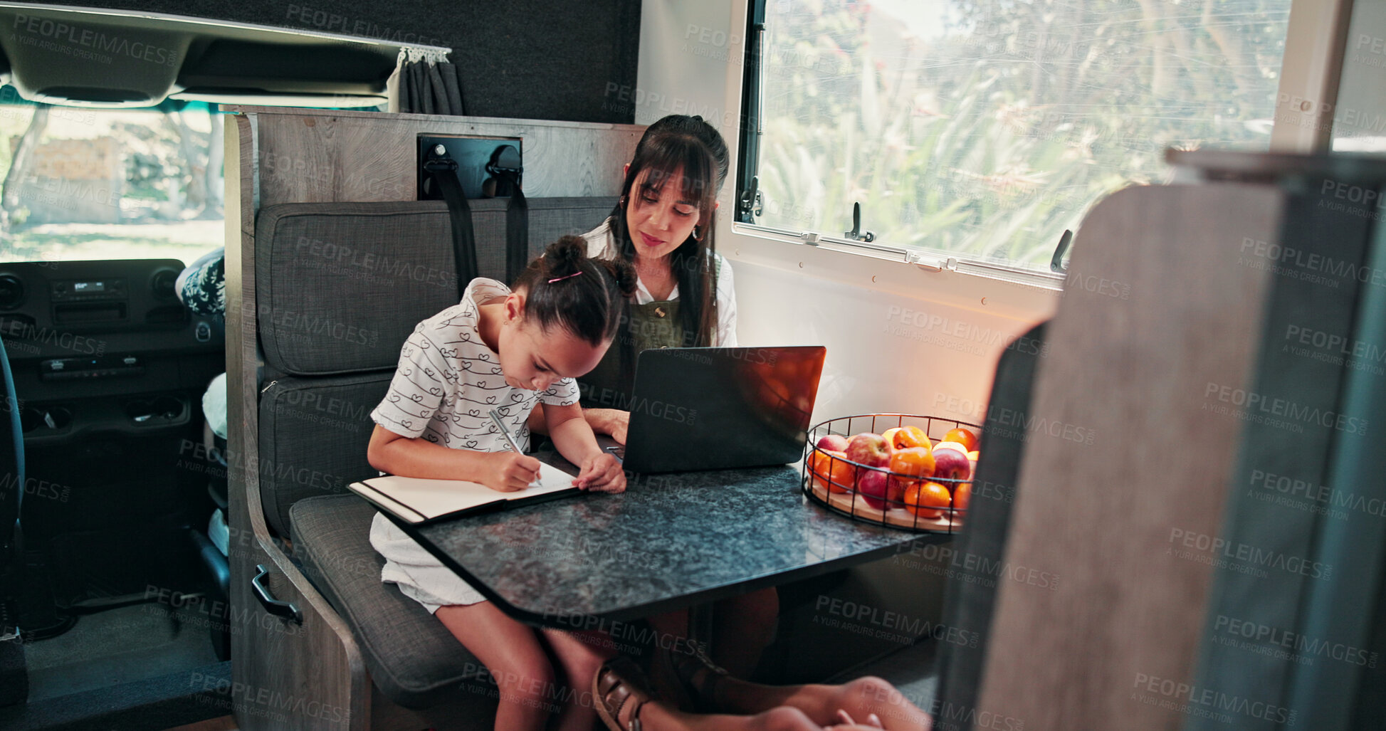 Buy stock photo Laptop, woman and girl with notebook in caravan, writing study notes and remote work for family trip. Transportation, mother or child with homework for education, research or pc for freelance project