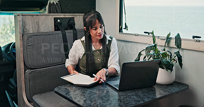 Buy stock photo Digital nomad, notes and woman with laptop in van for project, writer or research for fiction trends. Vehicle, remote work and mature person with journal for ideas, reading and plan story with tech