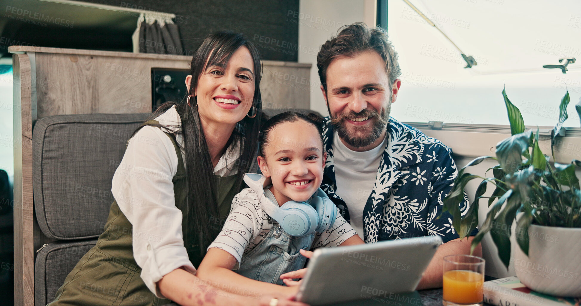 Buy stock photo Portrait, parents and child in camper van on tablet for nomad living, travel and bonding in mobile home. Family, happy and vehicle with mom, dad and girl on tech for videos, movies and vacation