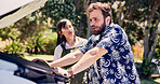 Frustrated, talking and couple with car breakdown in nature, travel crisis and conflict for engine problem. Argue, stress or people with blame for road trip failure, outdoor or towing service dispute