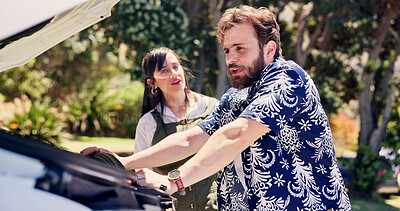 Buy stock photo Frustrated, talking and couple with car breakdown in nature, travel crisis and conflict for engine problem. Argue, stress or people with blame for road trip failure, outdoor or towing service dispute