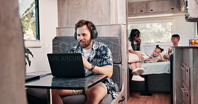 Buy stock photo Laptop, headphones and man in camper van with family for travel blog, copywriting and remote work. Freelance, computer and person with music for tourist guide, research and internet for nomad living