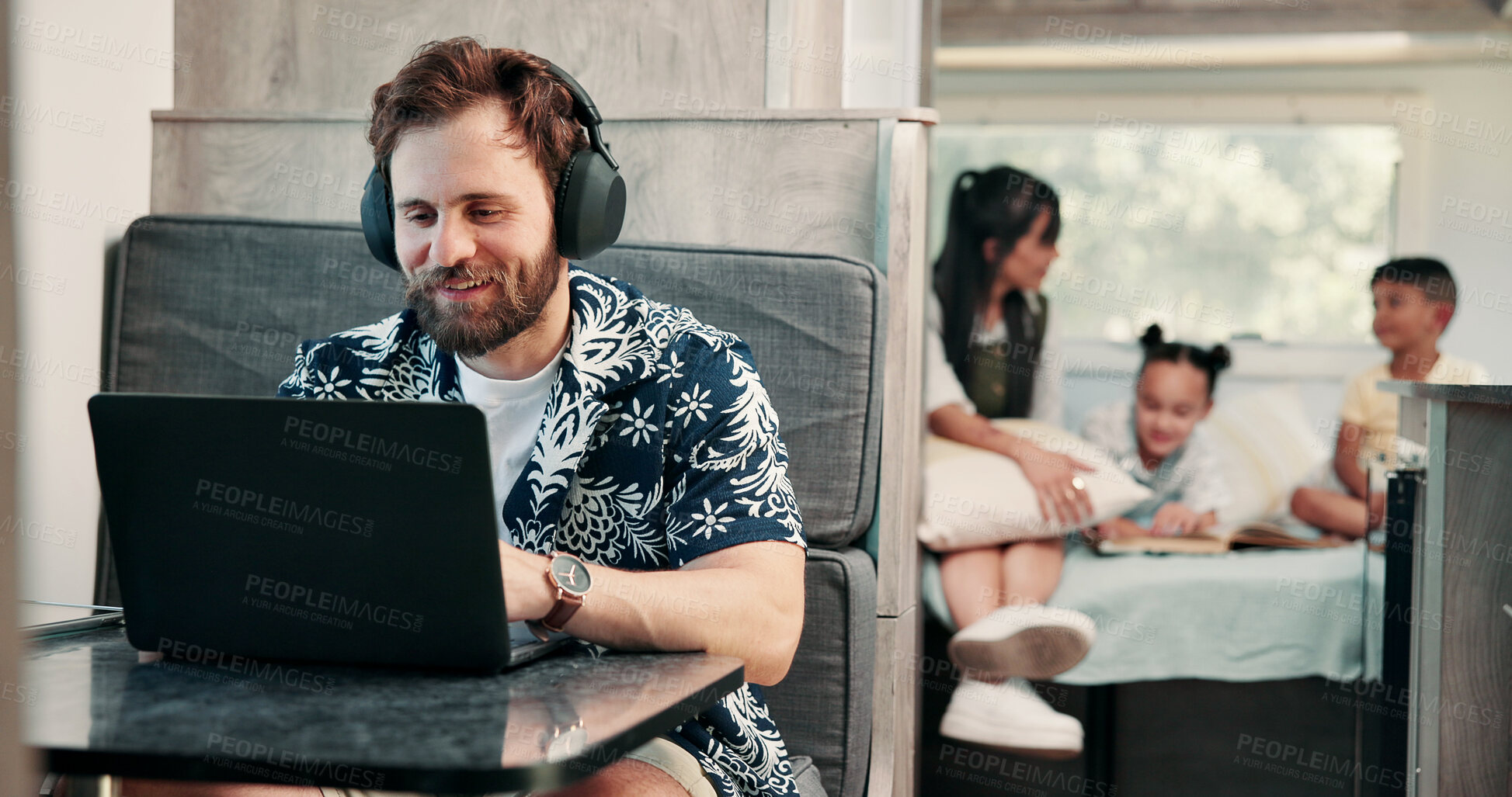 Buy stock photo Freelancer, headphones and man in camper van on laptop for travel blog, copywriting or remote work. Mobile home, family and person on computer for tourist guide, music or internet for nomad living