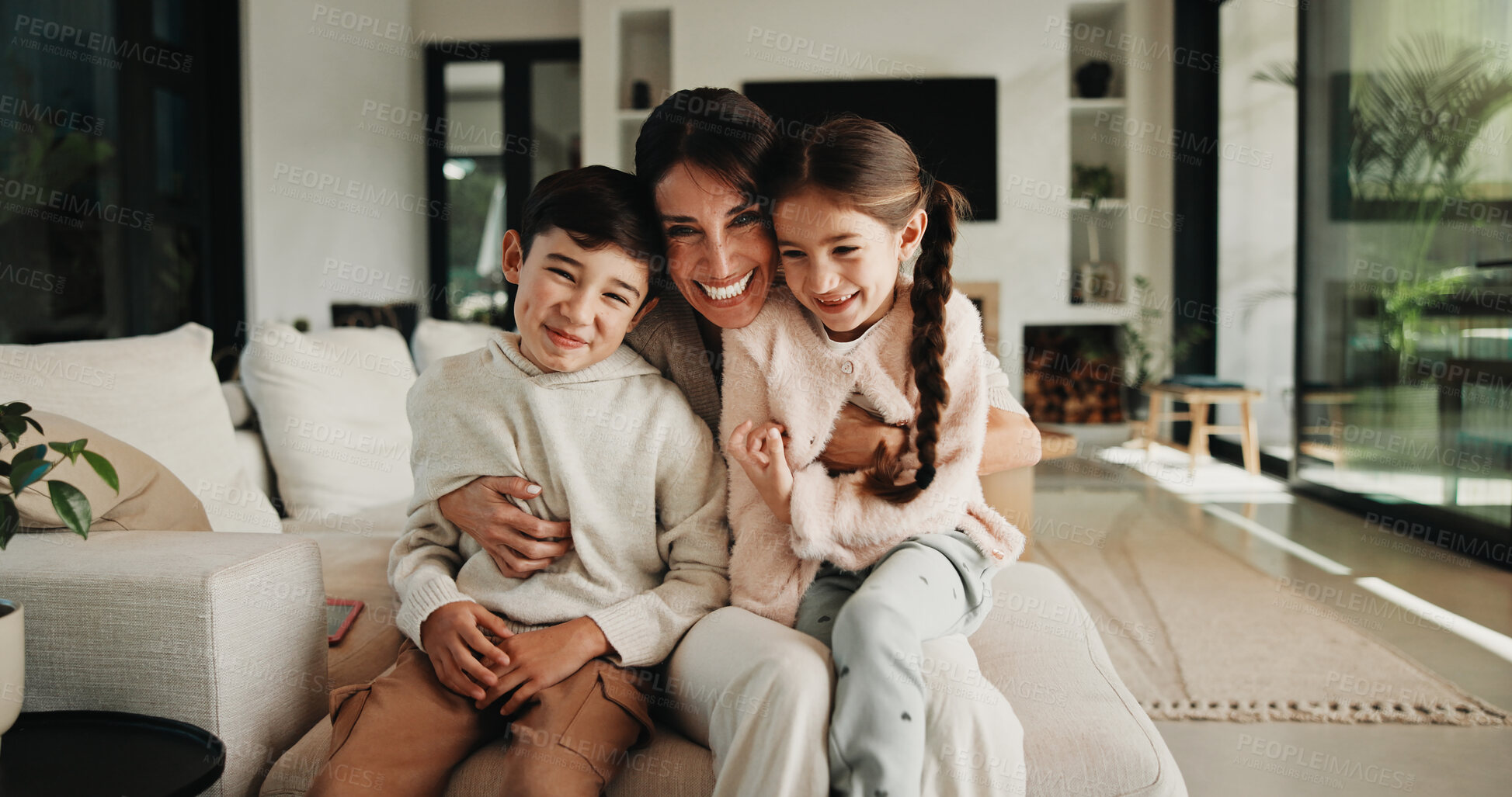 Buy stock photo Laughing, mom and children with hug in living room, funny joke and support for relationship security. Portrait, woman and kids with happiness for connection, family home and embrace for bonding