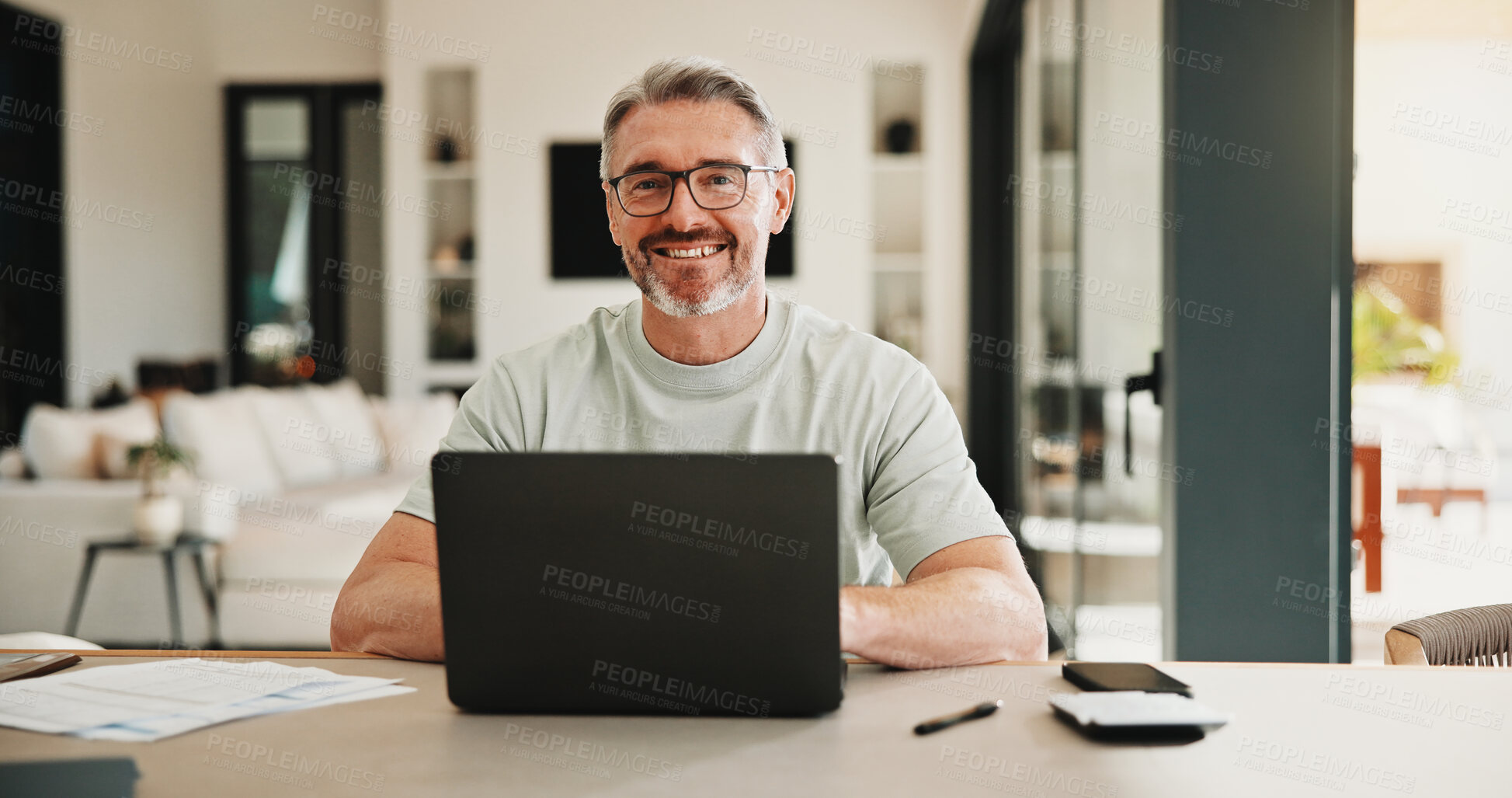 Buy stock photo Portrait, man and smile with laptop in home for research, finance report and budget income. Happy, mature person and pc for loan application, financial audit and online payment for household expenses