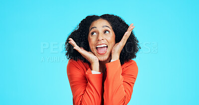 Buy stock photo Excited, businesswoman and success in studio with promotion announcement, reward and job opportunity. Space, happy person and winner with work bonus, good news and achievement on blue background.