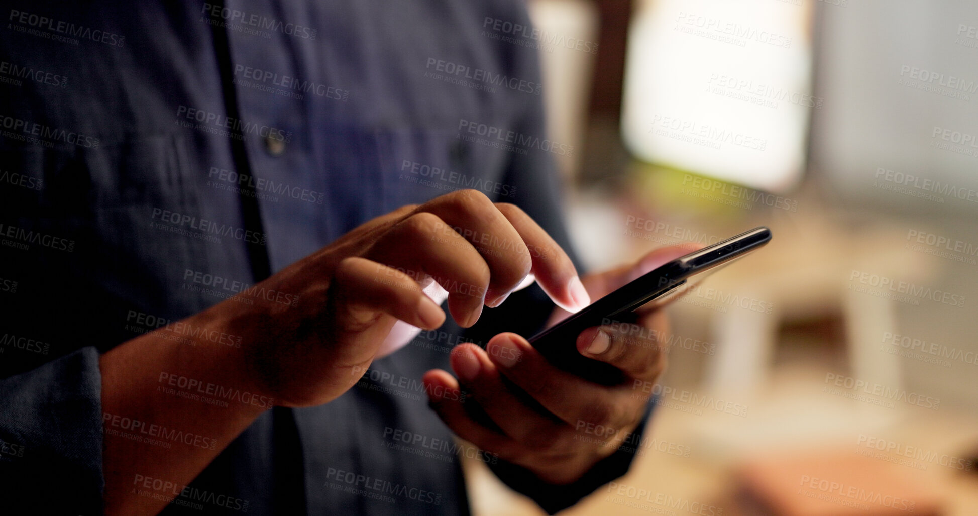 Buy stock photo Hands, phone and texting at night in office with contact, scroll or notification at finance company. Person, typing and overtime with mobile network, application or social media at investment agency