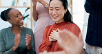 Applause, winning and business woman in celebration, meeting or teamwork together at office. Group of employees clapping in success for team goals, achievement or company promotion at workplace