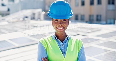 Buy stock photo Portrait, woman and arms crossed outdoor with solar panel, smile and technician for renewable energy. Confident, black person and engineer on rooftop with photovoltaic system, sustainability and PPE.