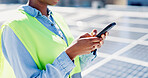 Phone, woman and hands of contractor by solar panels on roof for communication on maintenance approval. Cellphone, typing and female sustainability manager by photovoltaic cells for repair inspection