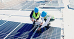 Men, engineer and team for solar panel with tablet on roof, discussion or inspection with installation. People, technician and architect with tech, application or sustainability with renewable energy