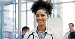 Happy, woman and portrait of doctor in hospital with confidence for career in medical service. Smile, professional and female cardiologist with pride for about us with healthcare help in clinic.