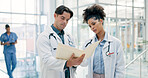 Doctor, team and talk in hospital with folder, patient history and paperwork for medical diagnosis. Healthcare worker, people and check file in clinic with test results, report and review document.