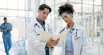 Buy stock photo Doctor, team and talk in hospital with folder, patient history and paperwork for medical diagnosis. Healthcare worker, people and check file in clinic with test results, report and review document.