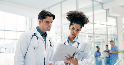 Buy stock photo Doctor, team and discussion in hospital with folder, patient history and worry for medical diagnosis. Healthcare worker, people and check file in clinic with test results, concern or review document.