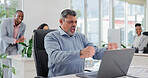 Fist pump, laptop and success with business man at desk in office for celebration or victory. Computer, shouting and target with mature employee in workplace for bonus, career goals or milestone