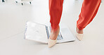 Feet, angry woman and crush laptop for business error, electronic problem or glitch on office floor. Shoes, employee and person step on computer, frustrated and destroy for fail with rage outburst