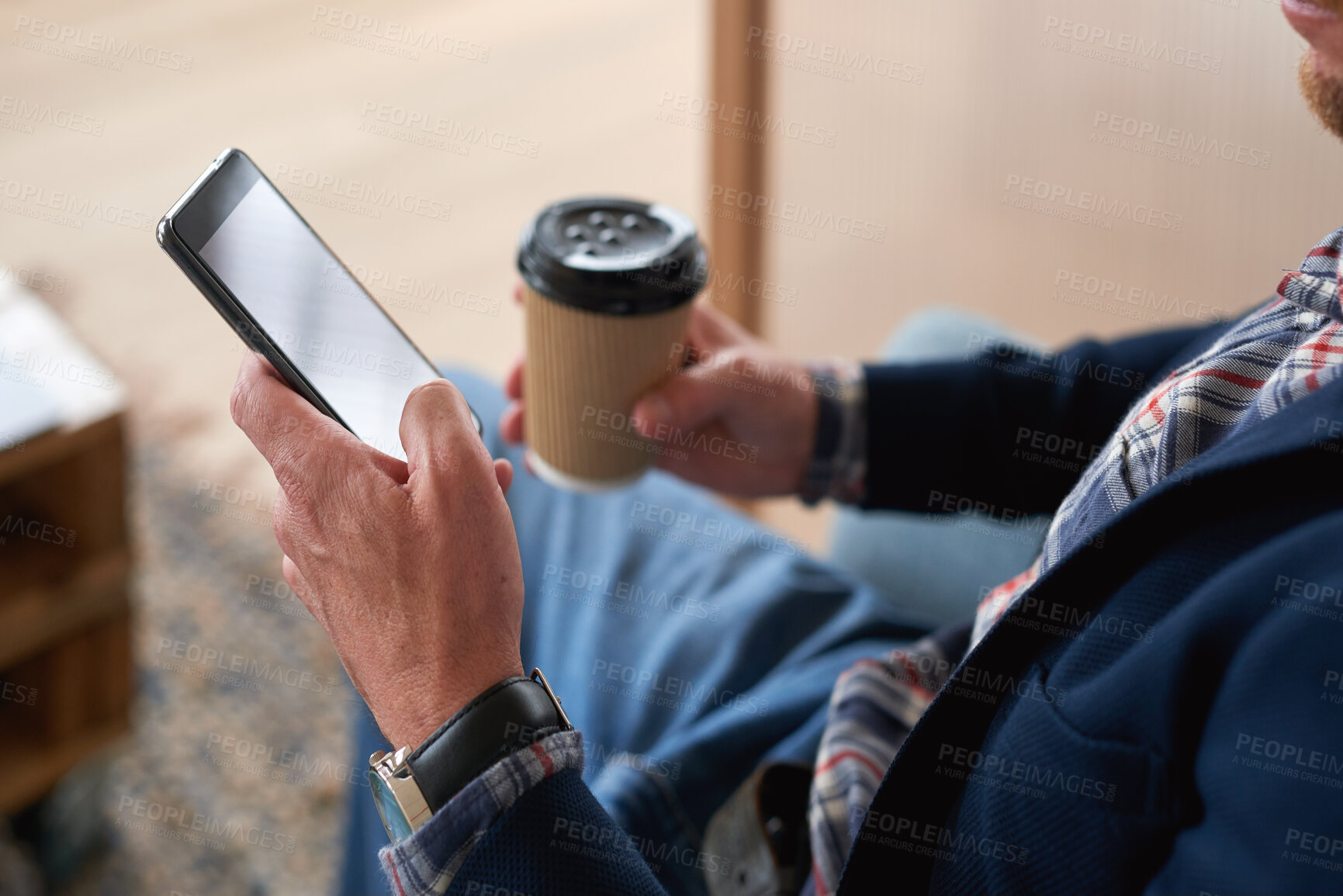 Buy stock photo Businessman, hands and typing with phone or coffee for social media, conversation or chat in home. Male person, texting or scrolling with mobile smartphone, drink or cup of caffeine for network app