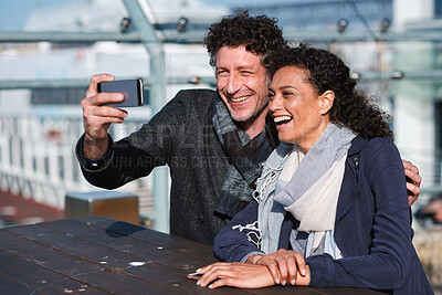 Buy stock photo Tourism, happy and selfie of couple in city for memory, profile picture and post for social media. Marriage, travel and man with woman with photo for holiday, vacation and interracial relationship
