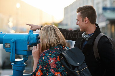 Buy stock photo Tourism, telescope and couple in city with view on holiday for travel, vacation and trip together. Marriage, happy and man with woman for bonding, relationship and pointing for sightseeing outdoor