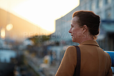 Buy stock photo Thinking, business and woman travel in city for real estate, ideas and vision of urban development. Mature realtor, commute or reflection for property choice, infrastructure and expansion opportunity