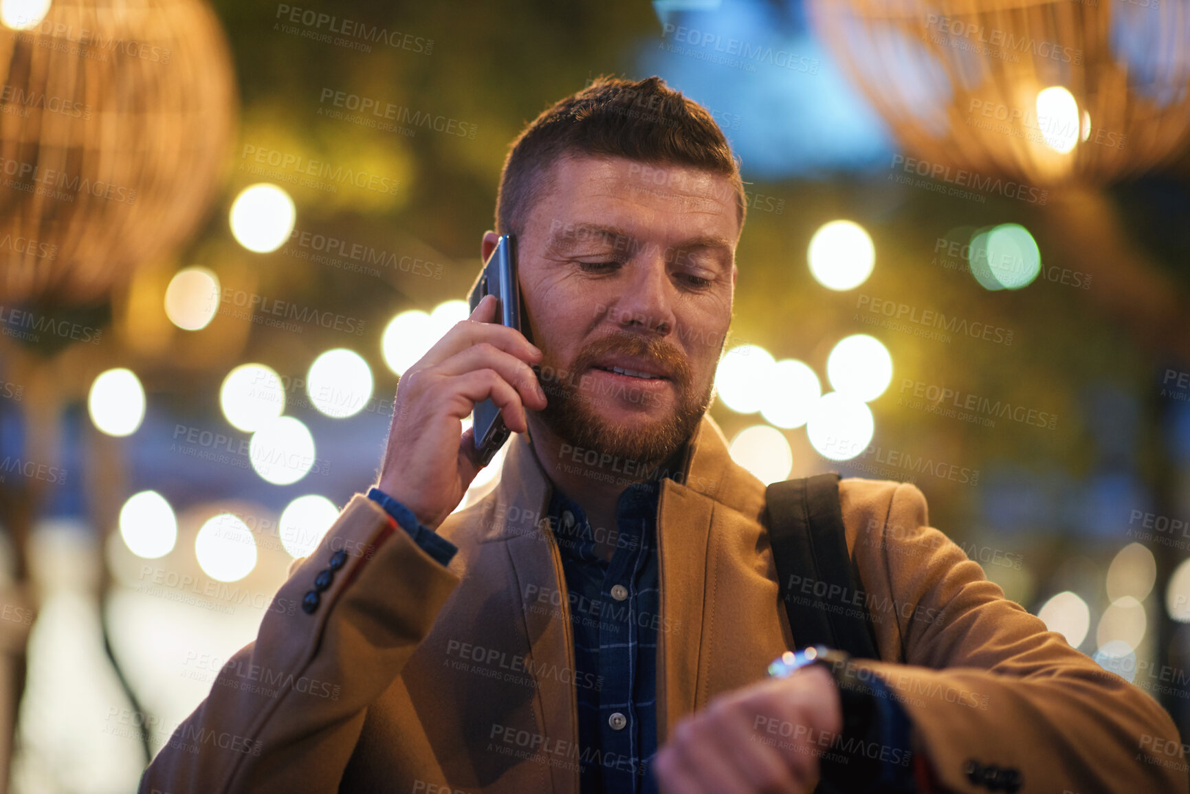 Buy stock photo Man, night and watch with phone call in city for schedule, reminder or checking time. Mature, male person or travel with wristwatch or smartphone for conversation or commute with bokeh in urban town