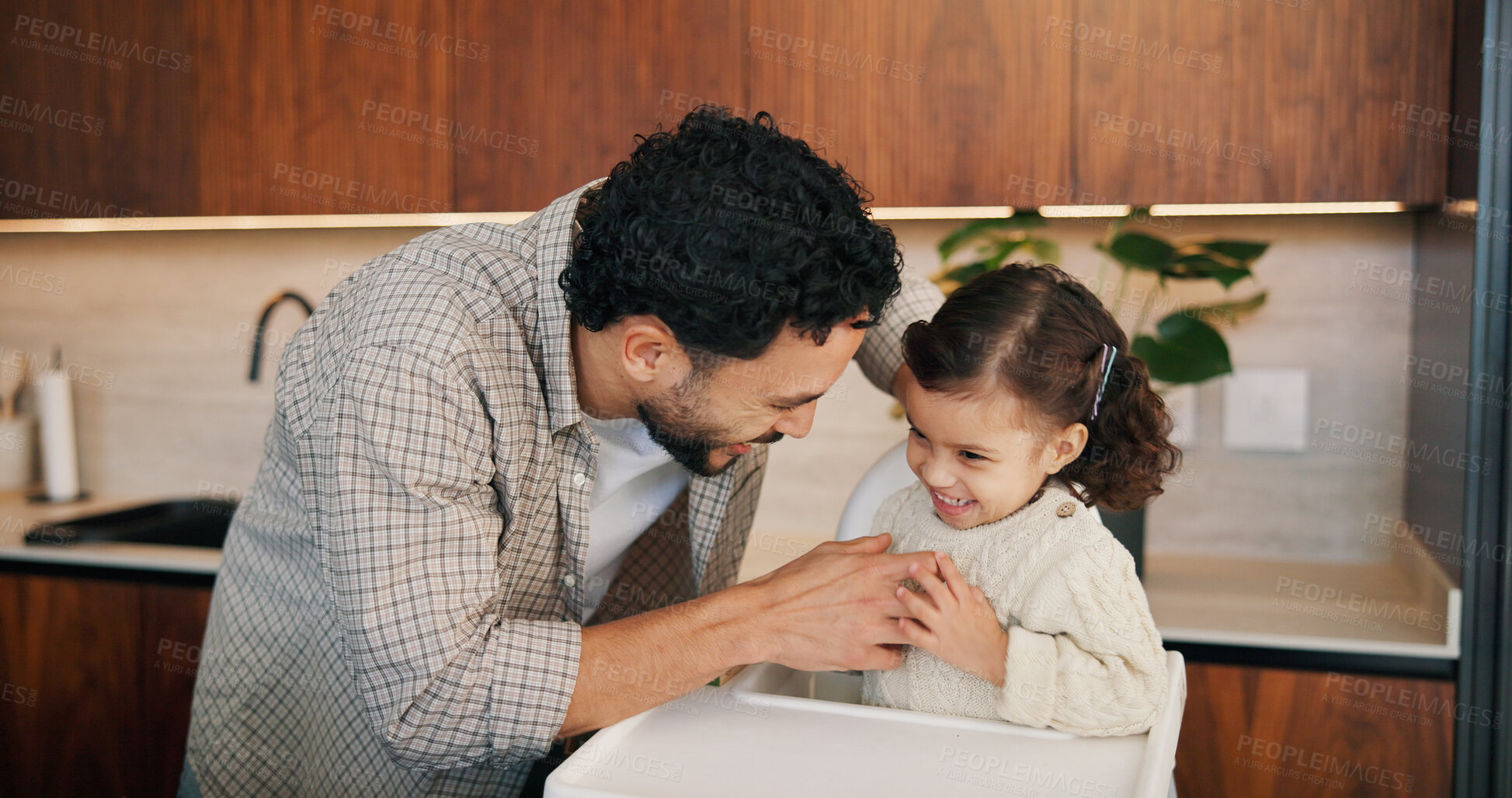 Buy stock photo Daughter, father and tickle in kitchen of home for bonding, development or family fun. Girl child, happy and high chair with playful single parent man in apartment for growth, safety or security